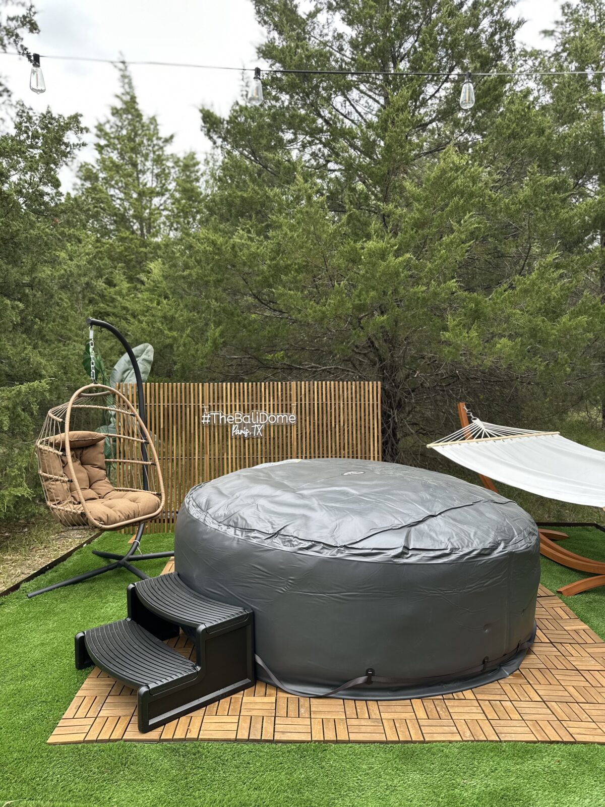 Luxury hot tub setup at Wander Glamping dome in Texas, perfect for romantic getaways or relaxing weekends with friends.